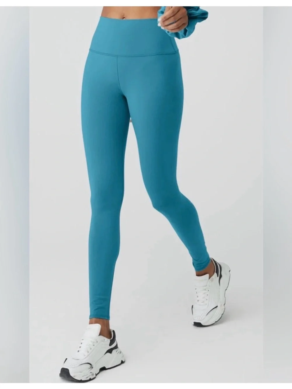 ALO Yoga woman’s Leggings in Teal Blue